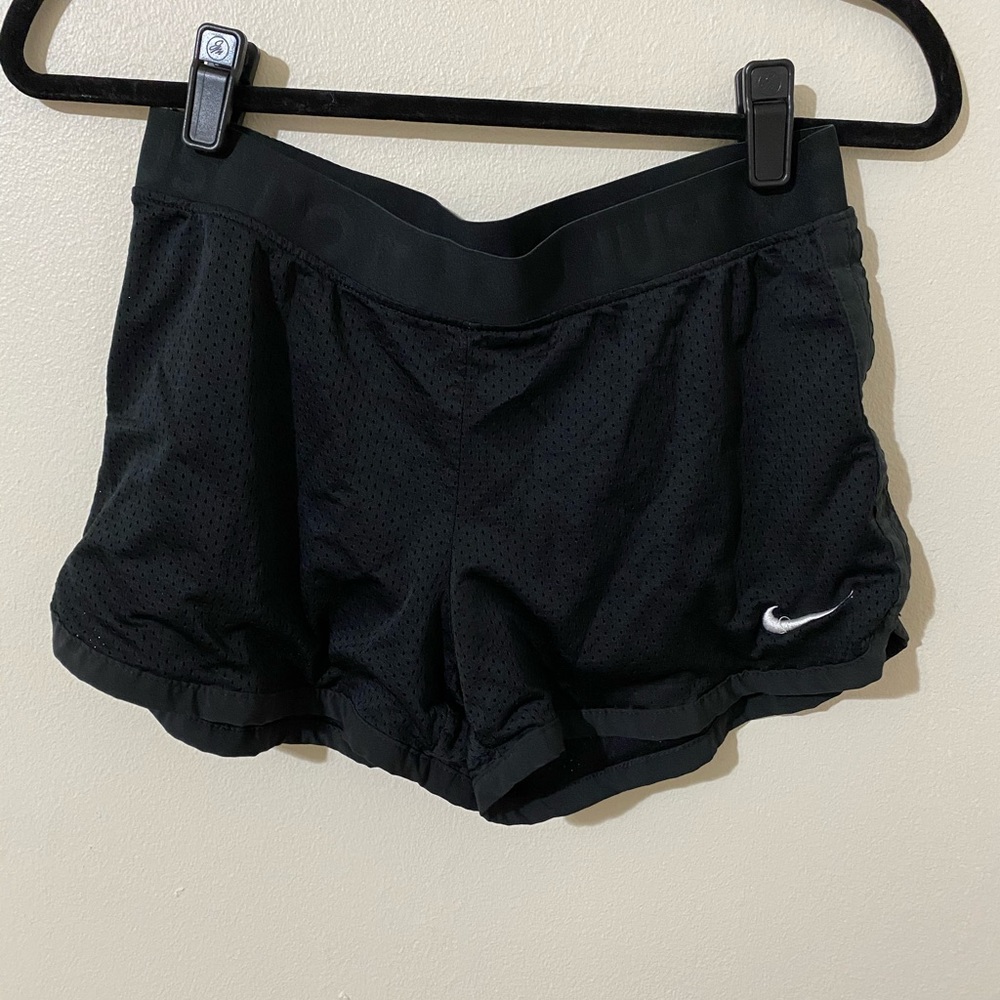 Black Nike mesh athletic shorts